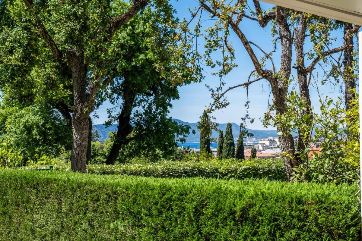 Image 3 of Garden-Level Apartment Pool & Sea View