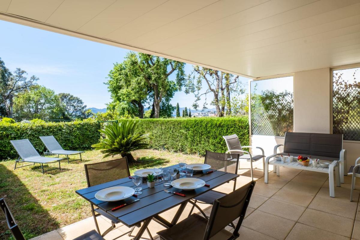 Image 1 of Garden-Level Apartment Pool & Sea View