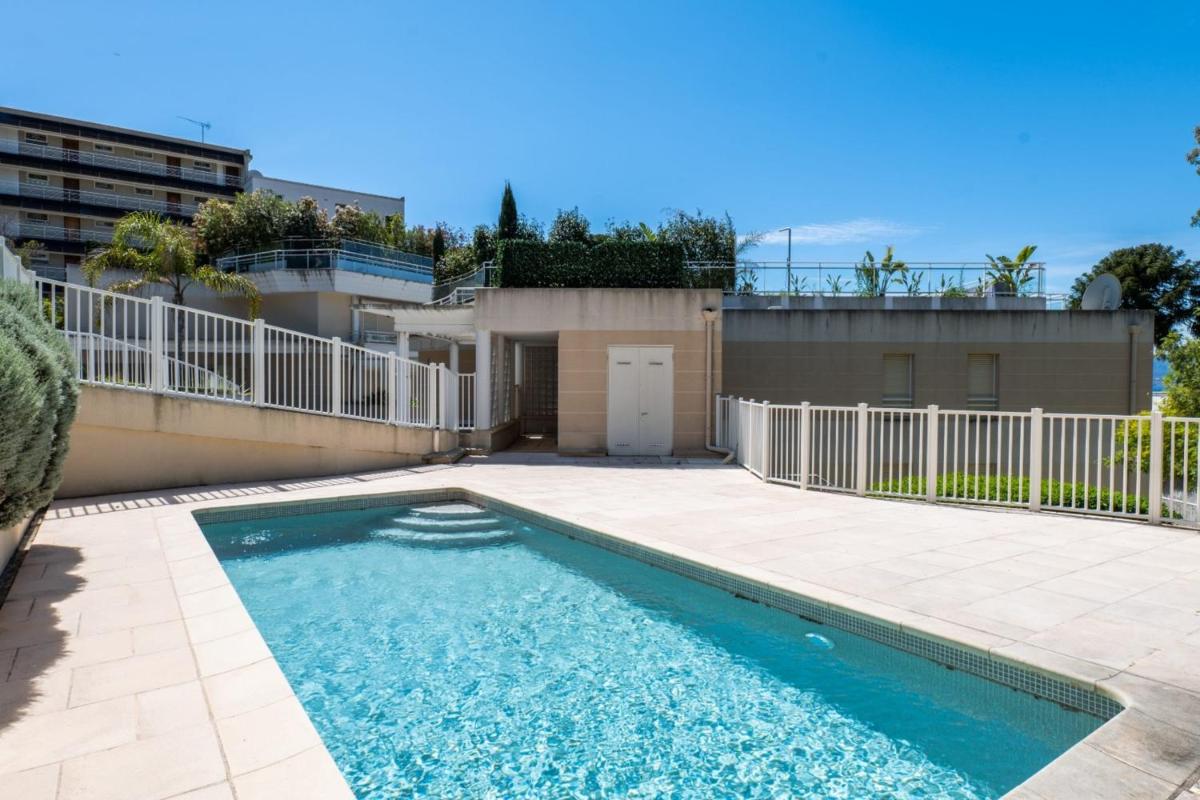 Image 6 of Garden-Level Apartment Pool & Sea View