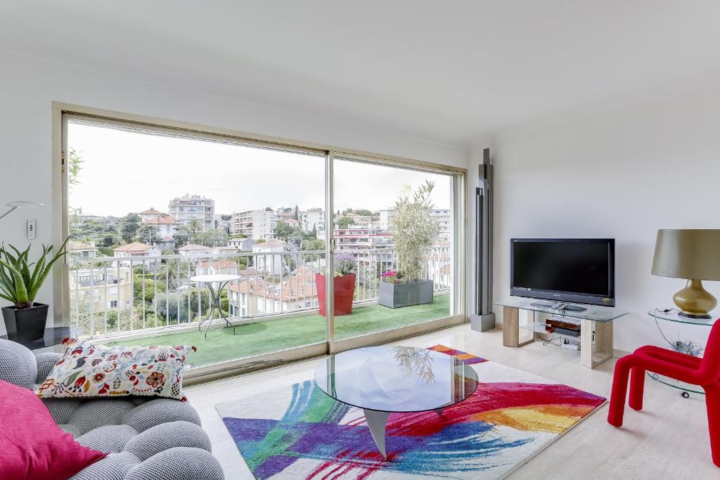 Image of IMMOGROOM – Apartment with terrace – AC – Parking